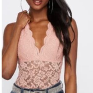 3/$20 Woman’s lace bodysuit